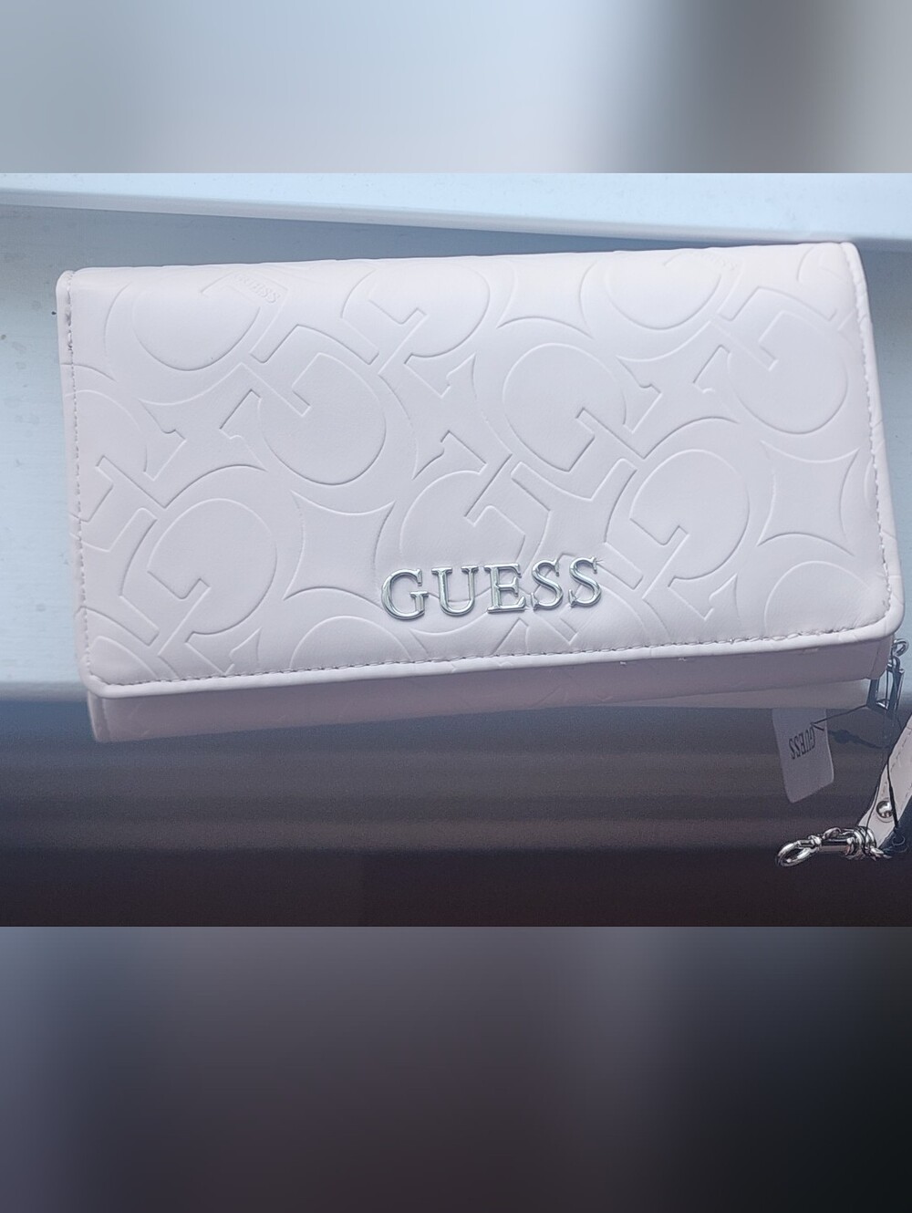 Guess Pale Pink Embossed Logo Wristlet with Silver Hardware - Picture 2 of 3